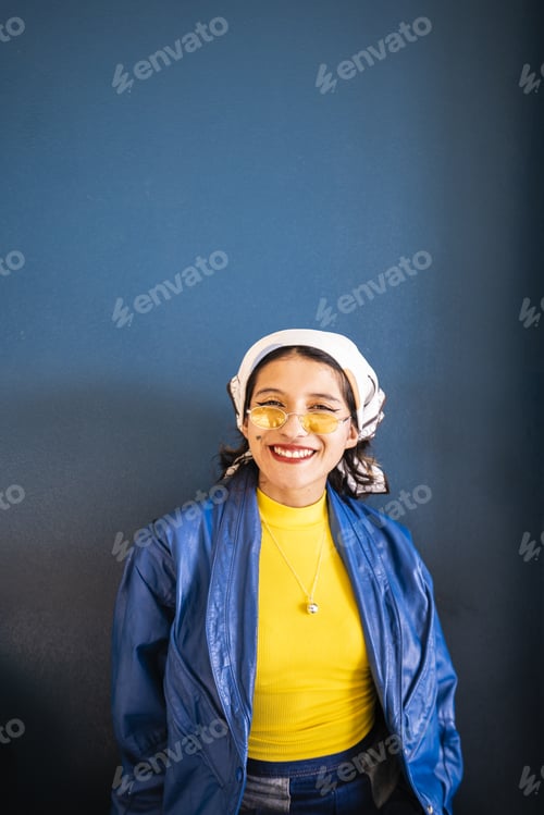 Preview: Portrait of a smiling and colorful young woman