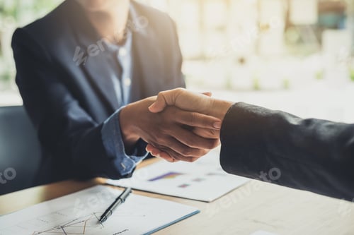 Preview: Business people shaking hands congratulations and confirmed the agreement and the investment partner