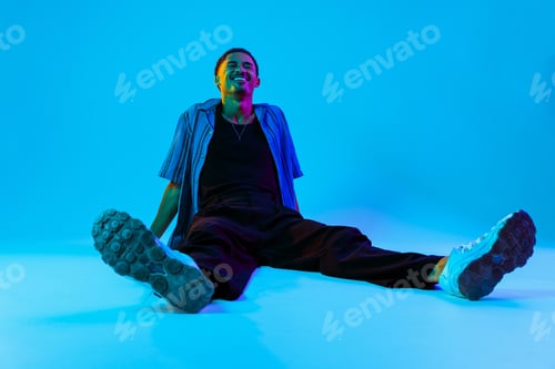 Preview: African man portrait in studio on colorful background