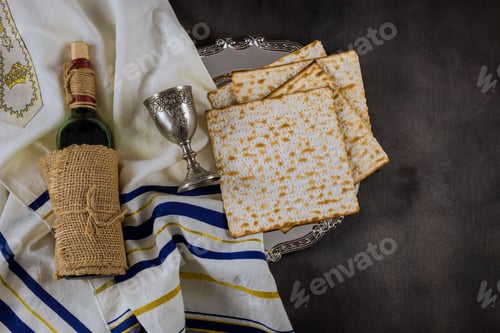 Preview: Passover holiday traditional celebration with cup wine kosher matzah on Jewish Pesach