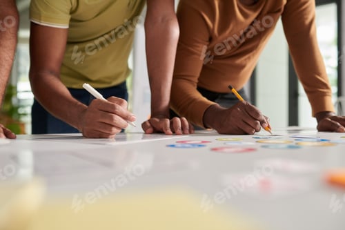 Preview: UX Designers Working on Set of Icons