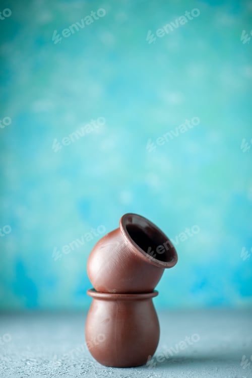 Preview: front view brown little pots on blue background ceramics color plate food meal kitchen cuisine