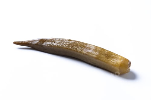 Preview: Okra slices isolated on white background. Close up