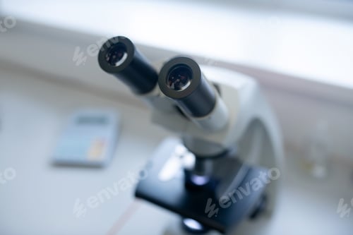 Preview: Close up picture of a microscope on the table