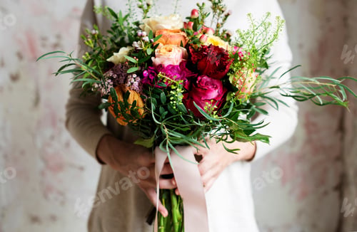 Preview: Woman Hands Holding Beautiful Flowers Bouquet