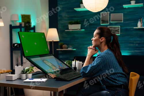 Preview: Professional photographer working with green screen and editing