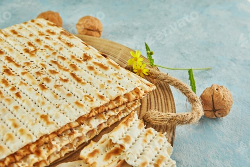 Preview: Pesach celebration concept - jewish Passover holiday. Matzah on wooden stand with nuts
