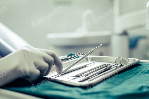 Preview: Dentists choose equipment on the table.