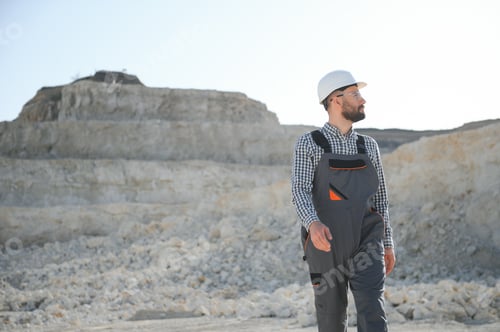 Preview: Worker and quarry in background