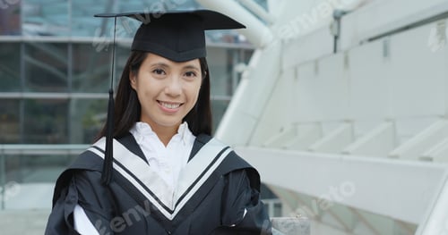Preview: Asian woman with graduation gown