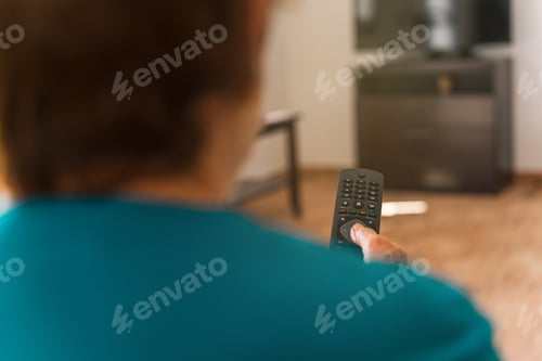 Preview: Older woman unrecognisable using TV remote control