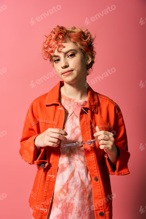 Preview: The Creative Contessa: Woman Wields Scissors in Orange Shirt