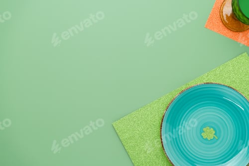 Preview: Green place setting for St Patricks dinner with a clover