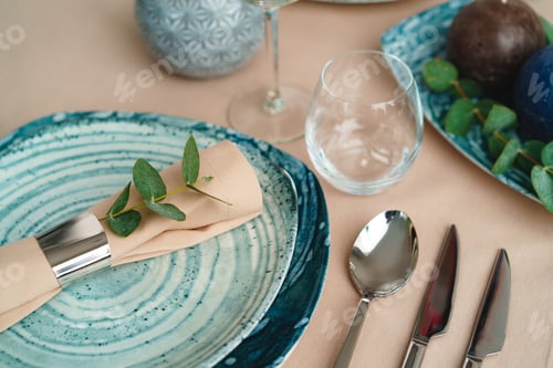 Preview: Luxury green table setting decorated with candles