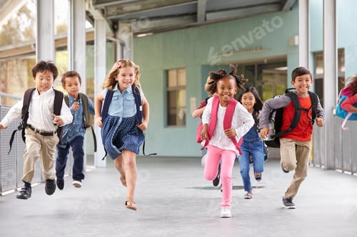 Preview: Group of elementary school kids running in a school corridor
