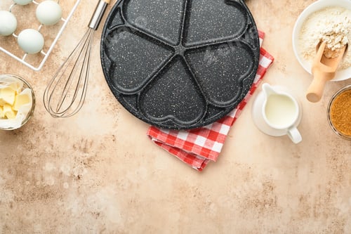 Preview: Empty frying pan black, skillet with stone nonstick coating for baking pancakes in shape of breakfas