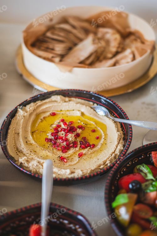 Preview: Healthy vegetarian food with hummus and salads
