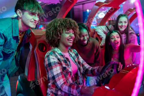 Preview: Group of Friends Enjoying a Fun Arcade Racing Game,