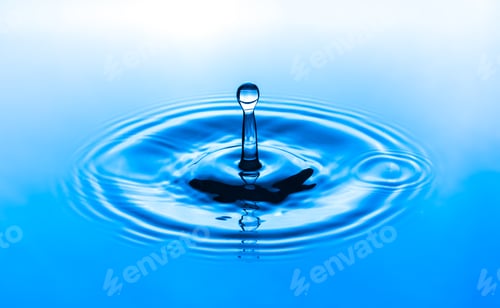 Preview: Water drop splashing into blue water surface. Health and purity concept