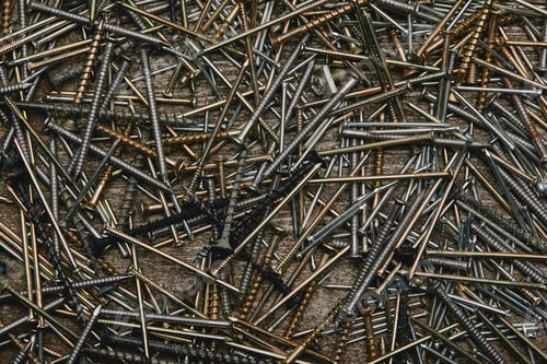 Preview: Top view of nails tools on dark wooden table