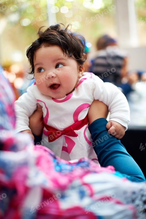 Preview: Shes such a happy little one. Shot of a muslim mother and her little baby girl.