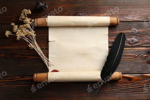 Preview: Old rolled scroll, feather, dry flowers and inkwell on wooden table, flat lay