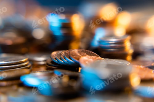 Preview: Nickels dimes and quarters with a shallow depth of field and selective focus about to collapse