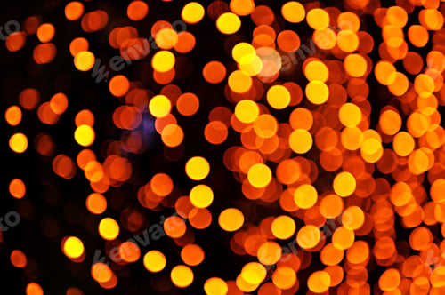 Preview: yellow bokeh on a dark background