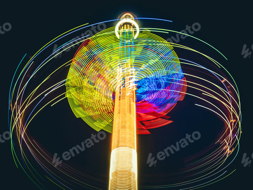 Preview: Colorful abstract traces of high whirling carousel on black background