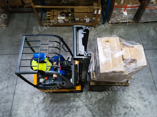 Preview: Warehouse man worker with forklift.