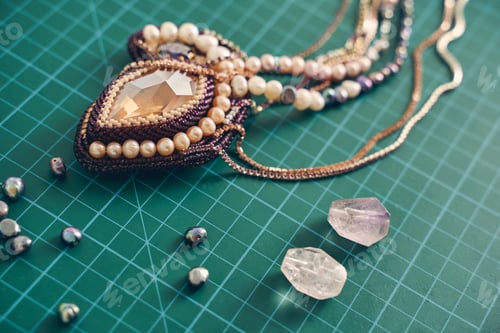 Preview: Top view of precious brooch with precious stones