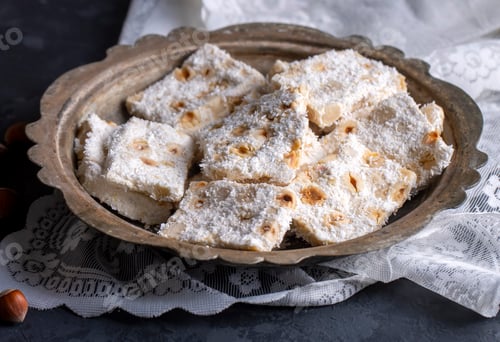 Preview: Turkish dessert; cezerye with hazelnuts and coconut (Turkish name; Findikli madonna)