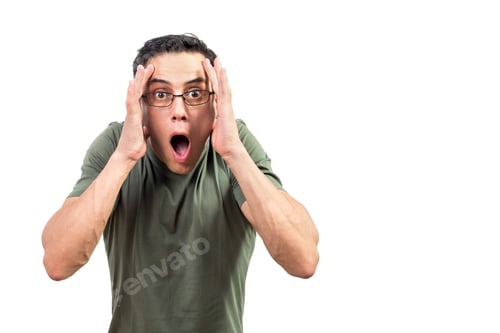 Preview: Shocked male nerd in glasses looking at camera