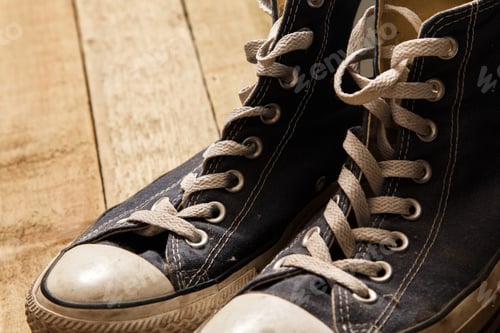 Preview: Gumshoes on wooden background