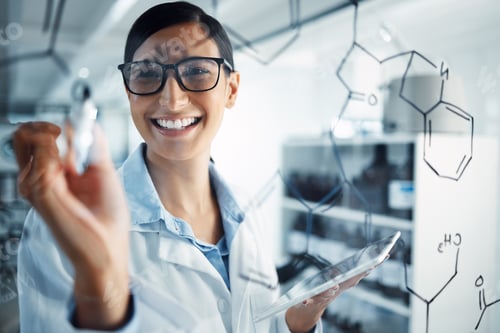 Preview: Shot of a young scientist solving equations on a glass screen in a laboratory