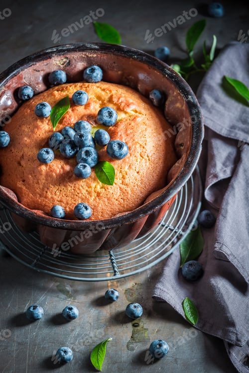 Preview: Homemade and rustic blueberries cake with fresh fruits