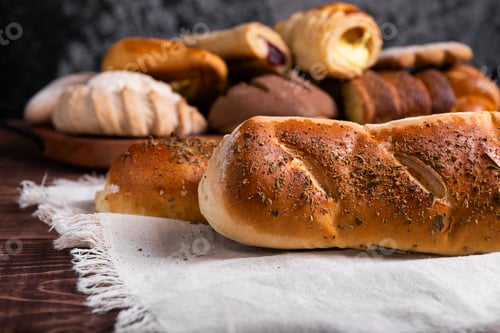 Preview: Artisan Herb-Crusted Bread on Rustic Wood