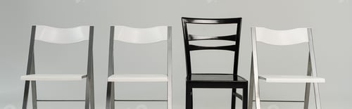 Preview: Black and white chairs isolated on grey, panoramic shot
