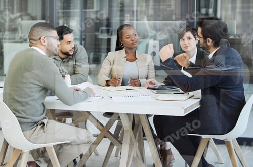 Preview: Shot of a group of businesspeople having a meeting in an office at work