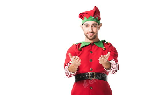 Preview: man in christmas elf costume with outstretched hands gesture looking at camera isolated on white