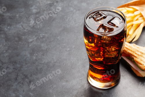 Preview: Glass of cola with ice, club sandwich, potato fries