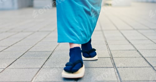 Preview: Legs, slippers and walking in city street with traditional clothes, outfit and fashion for heritage