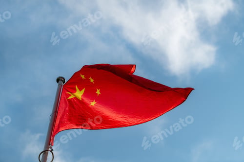 Preview: The national flag of Serbia waving in the blue sky