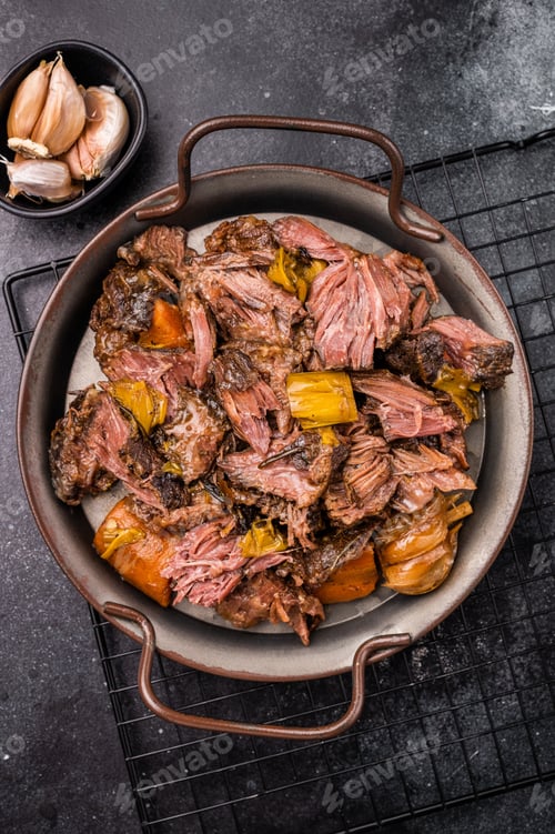 Preview: Braised Beef Cheek Stew, traditional Slow cooked meat. black background. top view