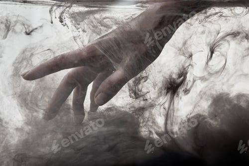 Preview: female hand in water with grey paint