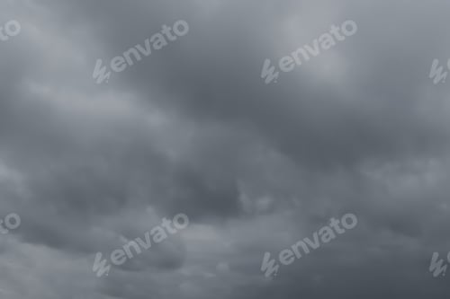 Preview: Sky with heavy rainy clouds on grey day