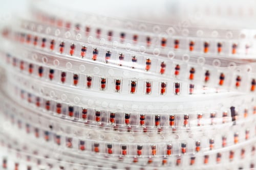 Preview: Plastic tape with capacitors electronic devices