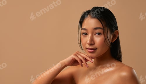 Preview: Beautiful young woman with clean fresh skin on face . Girl facial treatment .