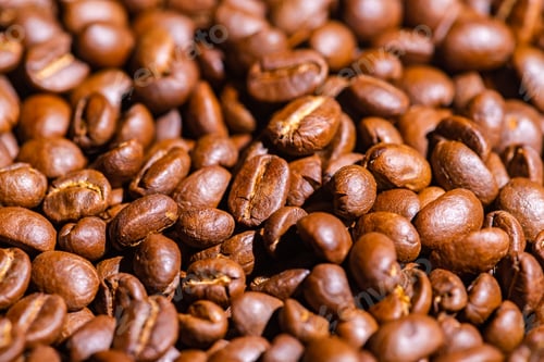Preview: abstract texture background of roasted coffee bean closeup, black brown seed ingredient