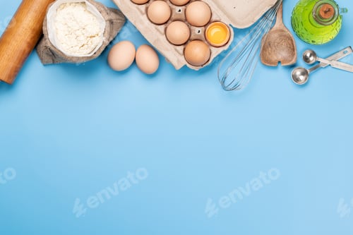 Preview: Cooking ingredients and utensils on blue background